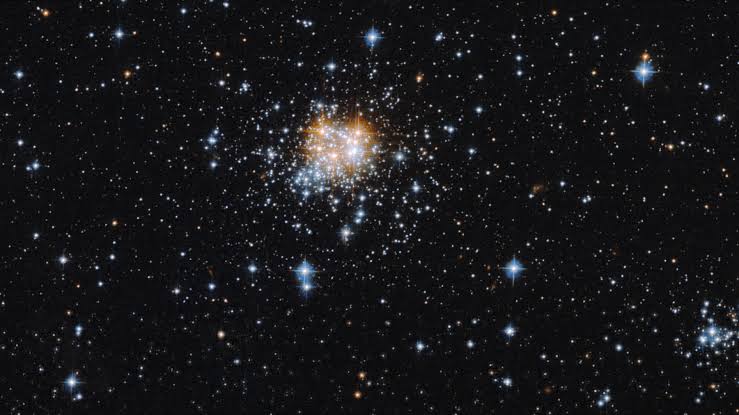 This Glittering Ball of Stars Is 160,000 Light-Years Away – And Hiding a Wild Secret