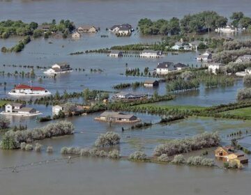 Floods head south after ravaging heartland