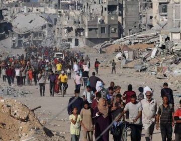 Gazans stream back home as Israel-Hamas ceasefire holds
