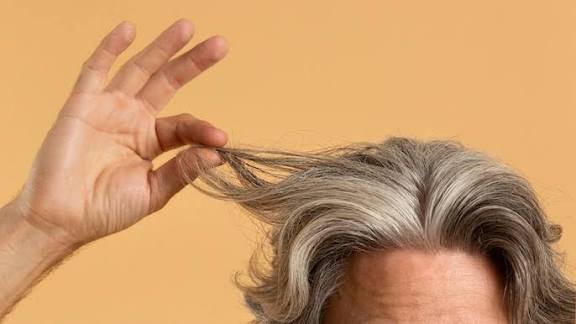 Gray Hair May Be Your Body’s Secret Cancer Defense