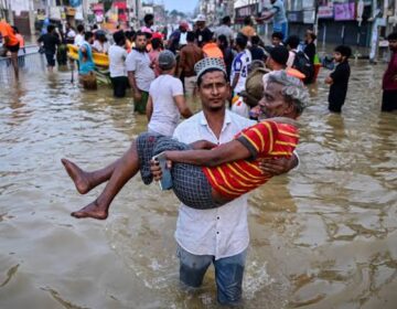 Asia floods death toll tops 1,100 as troops aid survivors