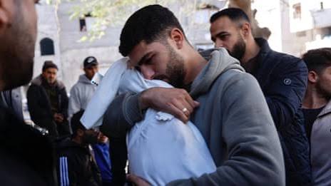 Dozens mourn six killed in Israeli shelling of Gaza shelter