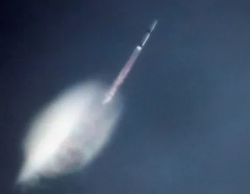 Blue Origin lands reused rocket booster for first time