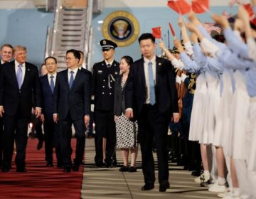Trump arrives in Beijing for high-stakes meeting with Chinese President Xi